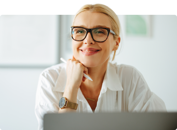 Woman with glasses smiling