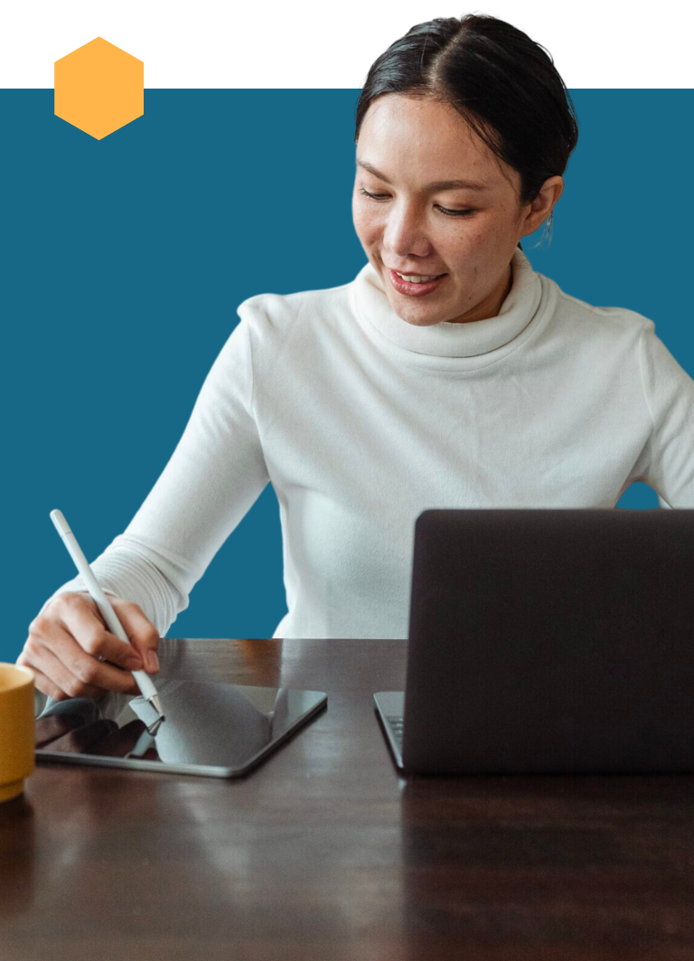 Woman writing on tablet