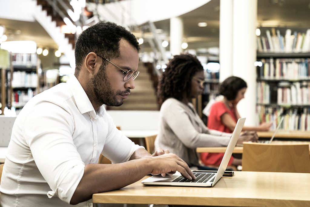 Students at computers in library